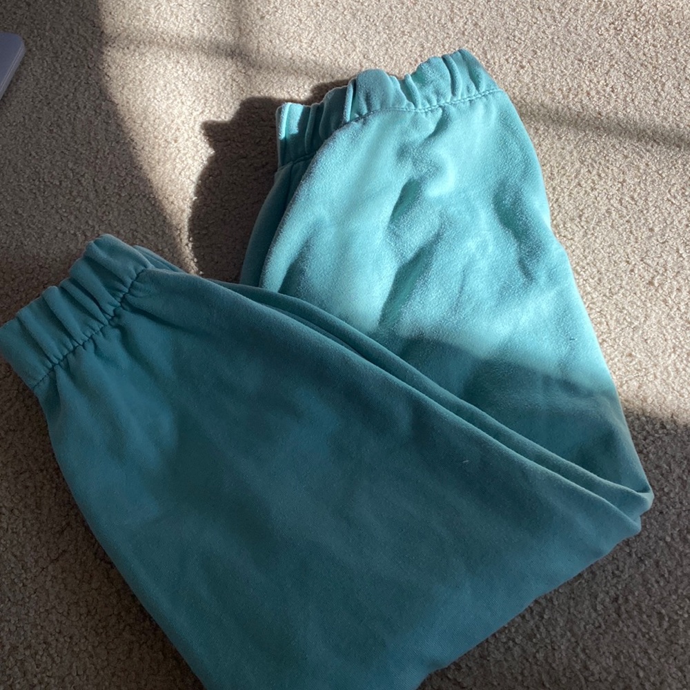 green sweatpants